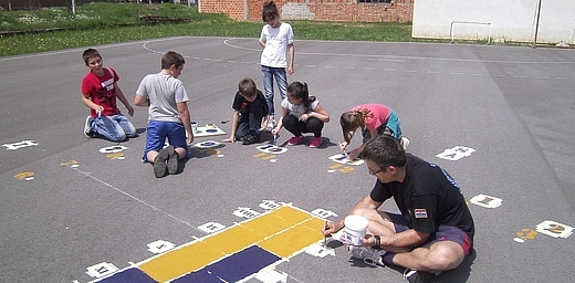 [ Human Sundial being painted, at a school in Croatia ]